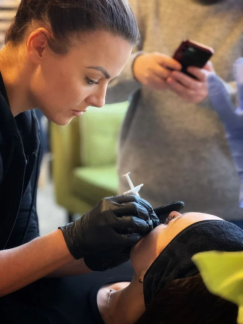 Nurse Rachel treating a client at Refined Medical Aesthetics